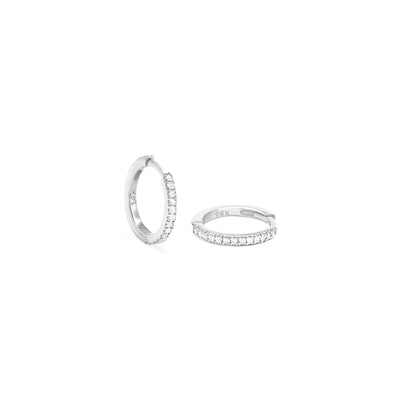 White gold diamond hoop earrings on white background