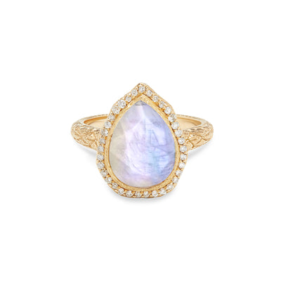 14 Karat Yellow Gold Ring with Pear Shaped Moonstone Stone with Halo of White Diamonds Against White Background