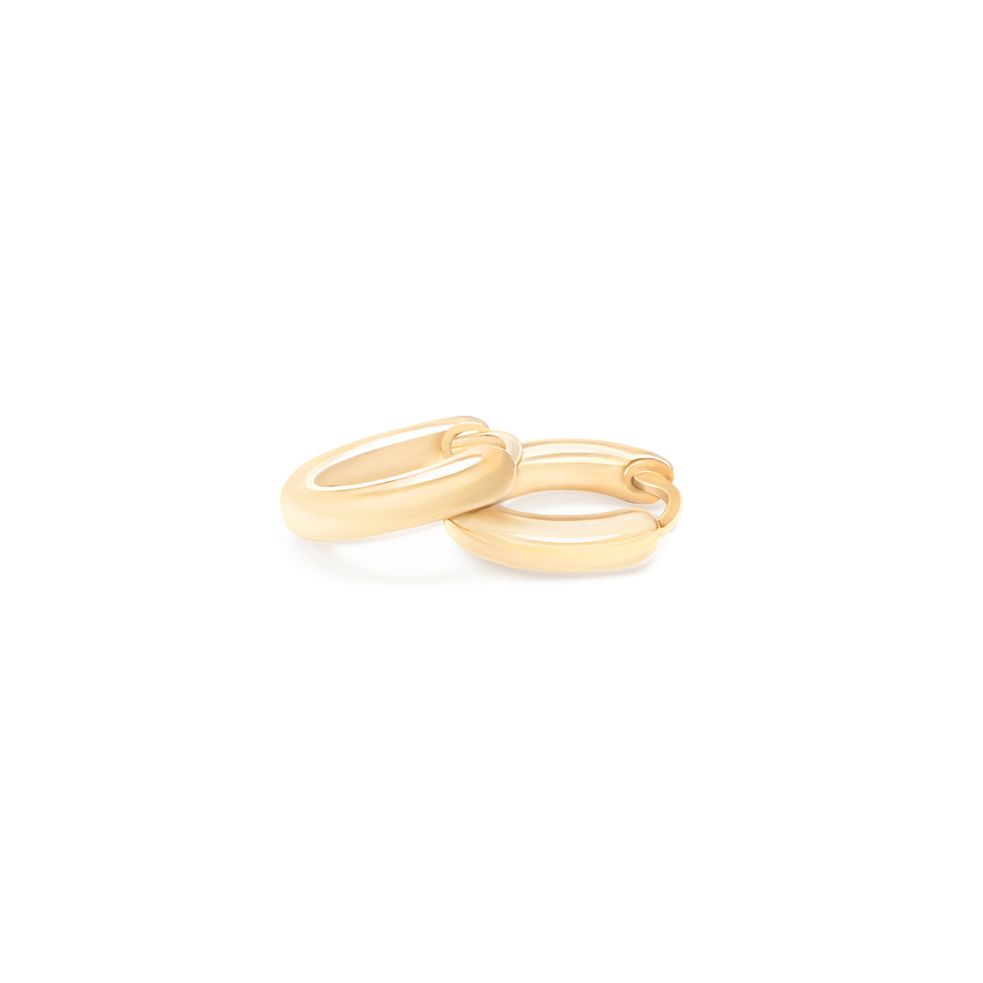 yellow gold hoops on white background