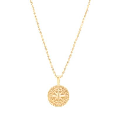 Compass pendant yellow gold on rope chain on white background