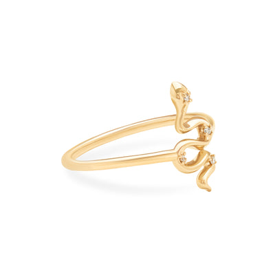 14k Karat yellow gold snake ring with diamonds on white background turned for detail