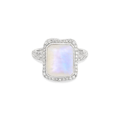 14 Karat White Gold Ring with Rectangle Shaped Moonstone with Halo of White Diamonds Against White Background
