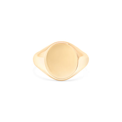 Yellow gold men’s signet ring with a round flat top that can be engraved