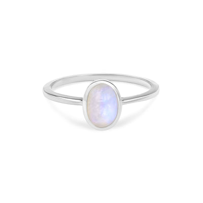 14 Karat White Gold Ring with Oval Shaped Moonstone Stone Against White Background