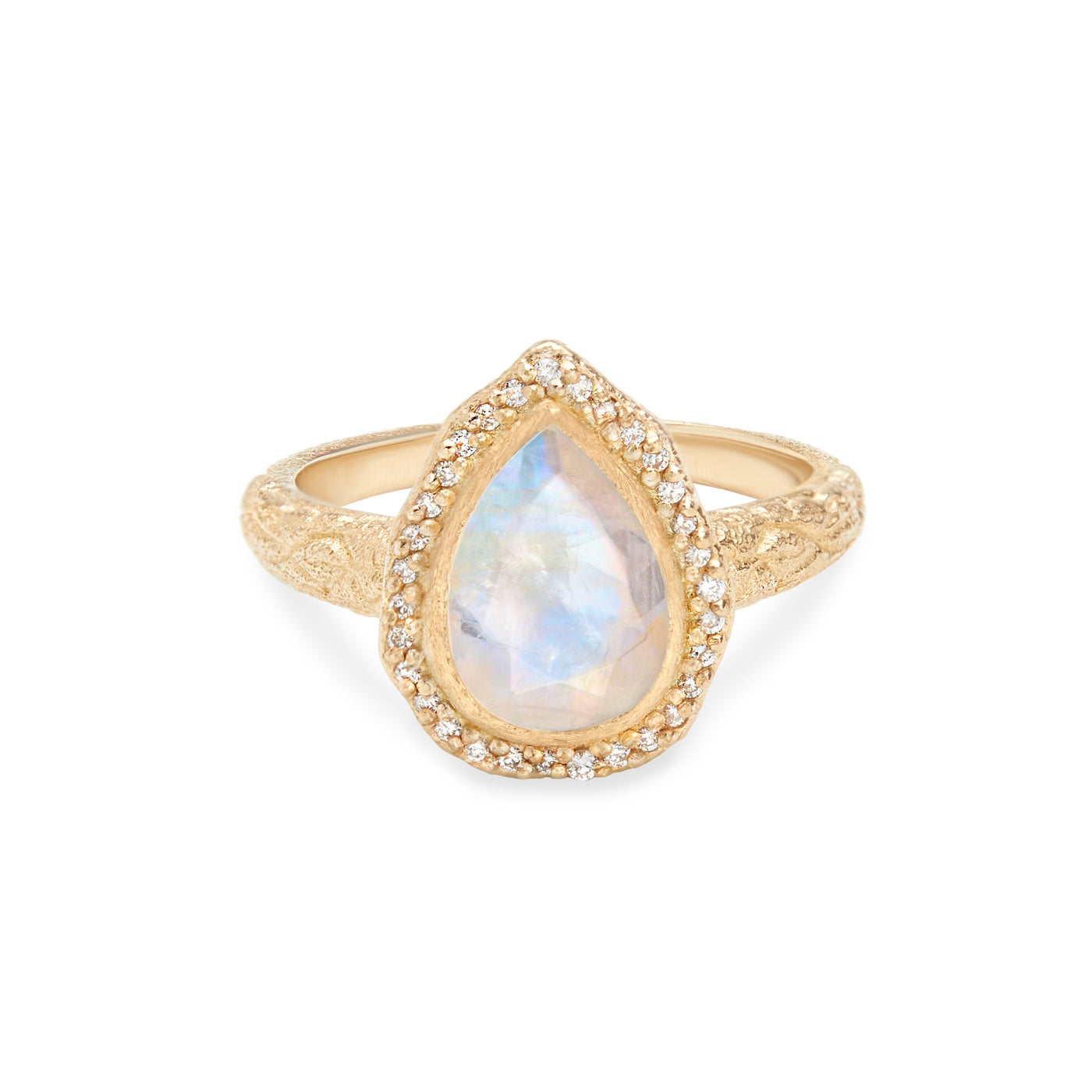 14 Karat Yellow Gold Ring with Pear Shaped Moonstone with Halo of White Diamonds Against White Background