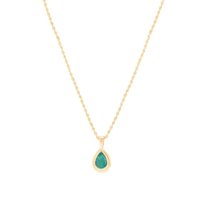 Emerald pear shaped pendant in yellow gold on rope chain on white background