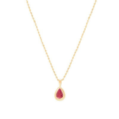 Ruby pear shaped pendant in yellow gold on rope chain on white background