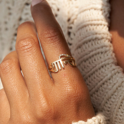 Model wearing Shanti Ring on first finger