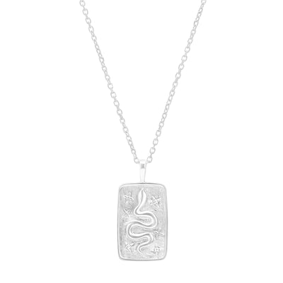 Snake pendant white gold on cable chain on white background