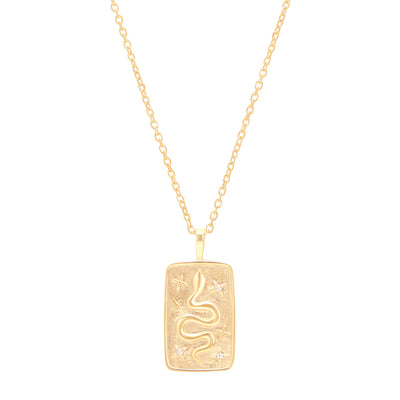 Snake pendant yellow gold on cable chain on white background